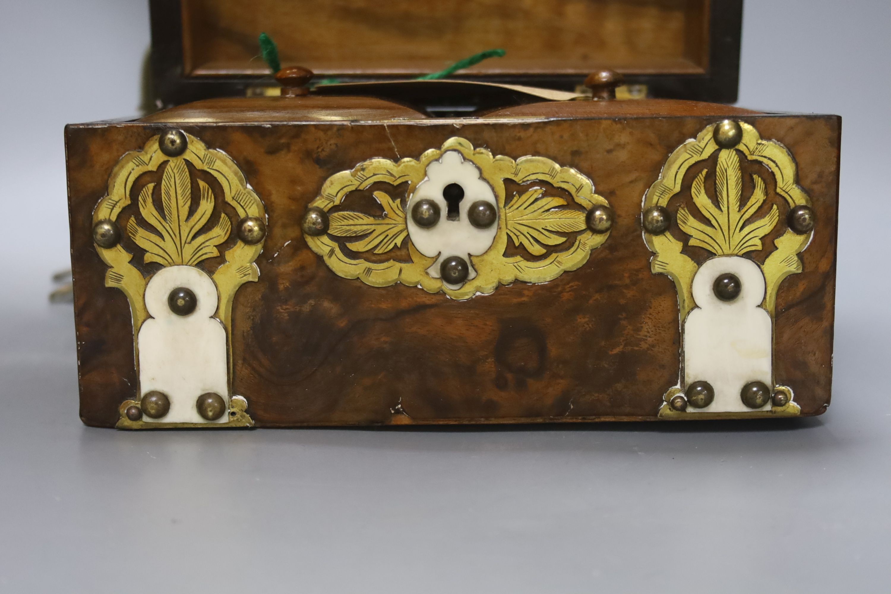 A Victorian brass mounted walnut tea caddy and a brass novelty stick stand, height 65cm